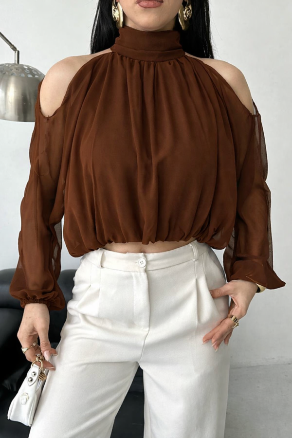 بنطلون قماش باللون البيج قصة زارا