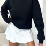 سويتر مبطة باللون الأسود