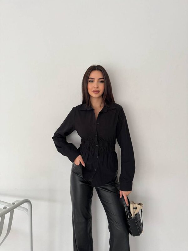 بنطلون قماش باللون البيج قصة زارا