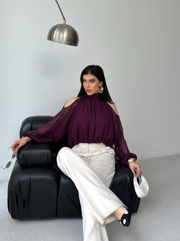 بنطلون قماش باللون البيج قصة زارا