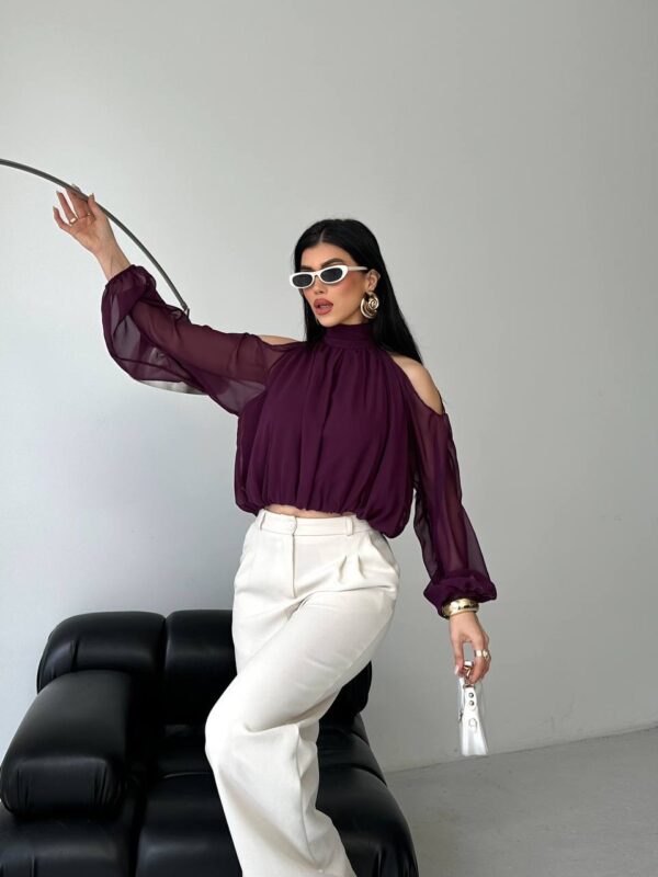 بنطلون قماش باللون البيج قصة زارا