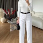 بنطلون قماش باللون البيج قصة زارا