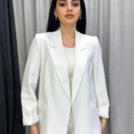 بنطلون قماش باللون البيج قصة زارا